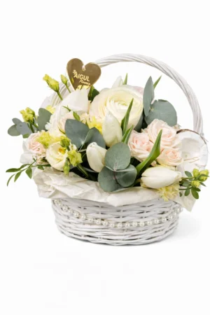 A delicate flower basket in milky cream tones