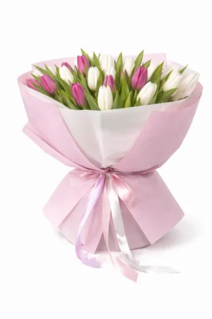 A bouquet of tulips in branded packaging by AIGUL Flowers